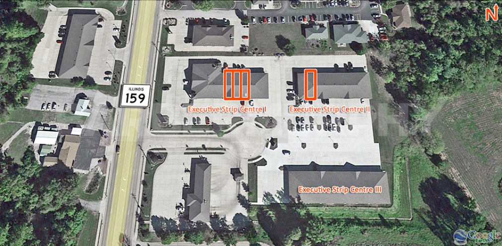 Aerial view of Executive Strip Centre showing available space for Lease