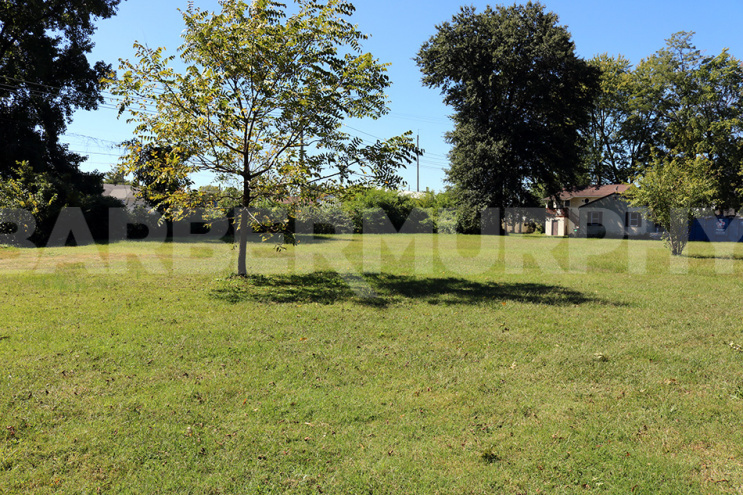 .77 Acre lot and storage garage 