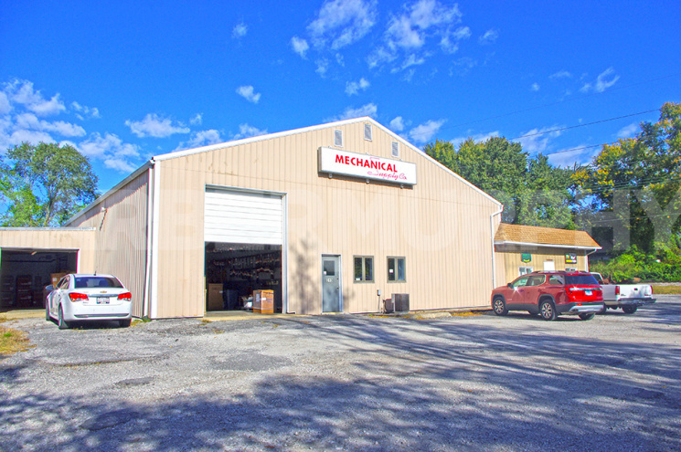 7,282 SF Warehouse: Two tenant building, currently leased 