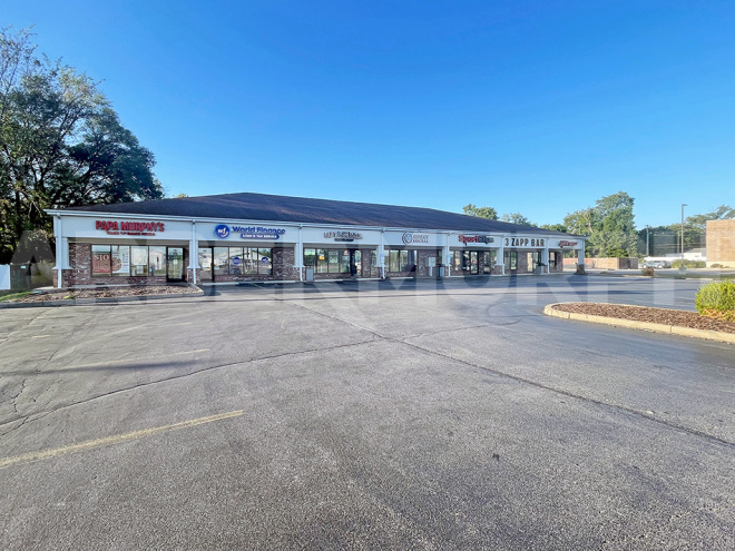 Exterior image of fully leased retail center for sale