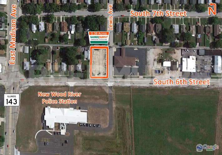Aerial Image of paved corner commercial site across from new Wood River Police Station at 179 S 6th St, Wood River, IL 62095, Madison County, SW Illinois