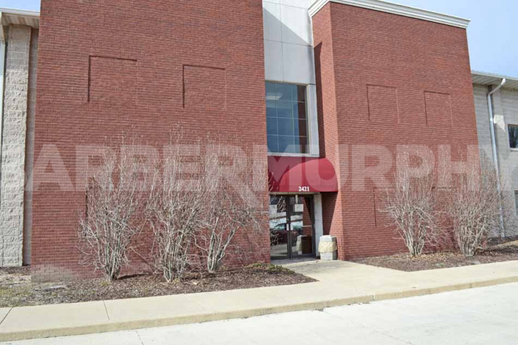 Exterior Image of Rear Entrance of Professional Office Building with Space for Lease